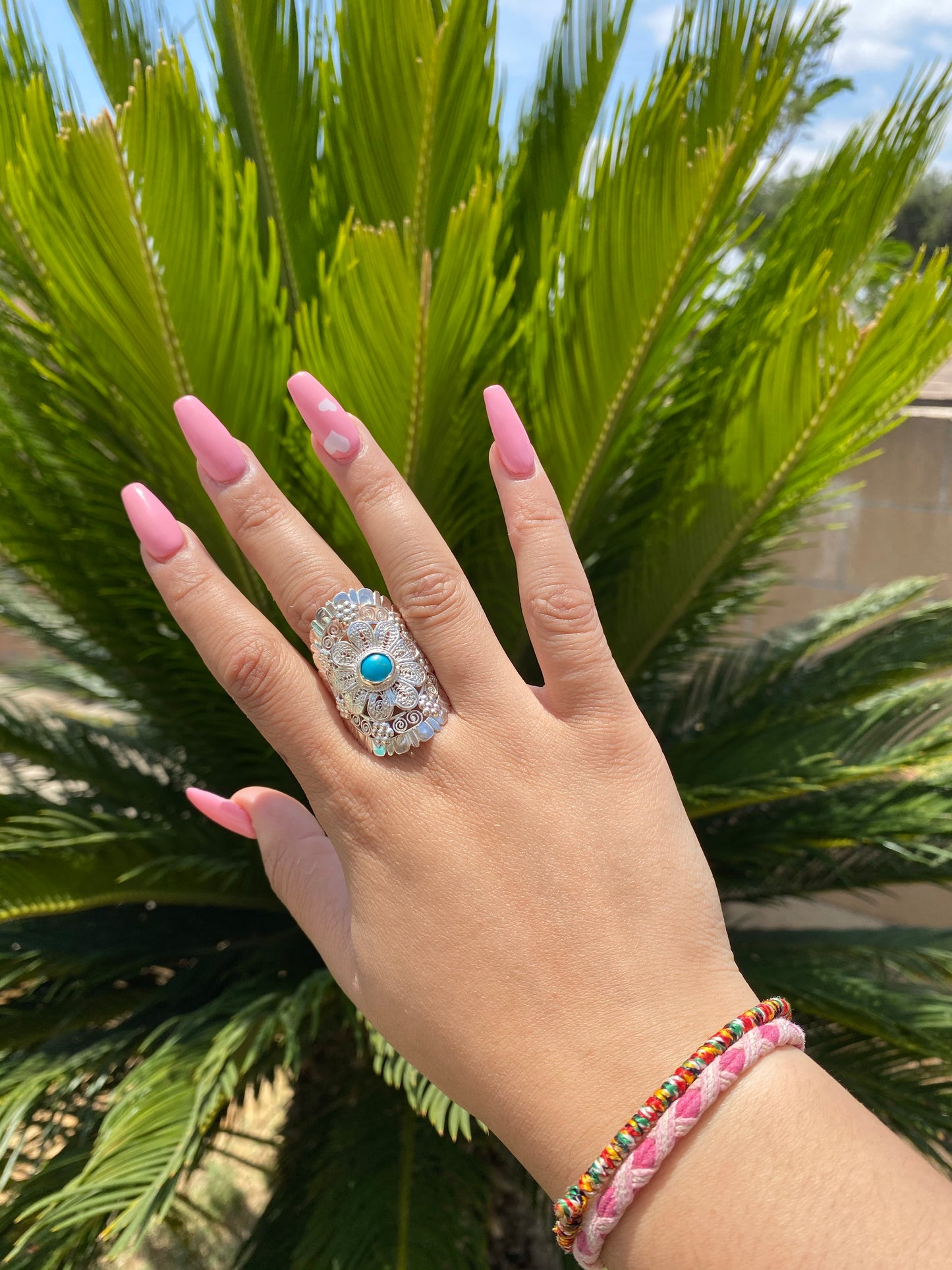 Anillo Ajustable con flor de filigrana y piedra turquesa